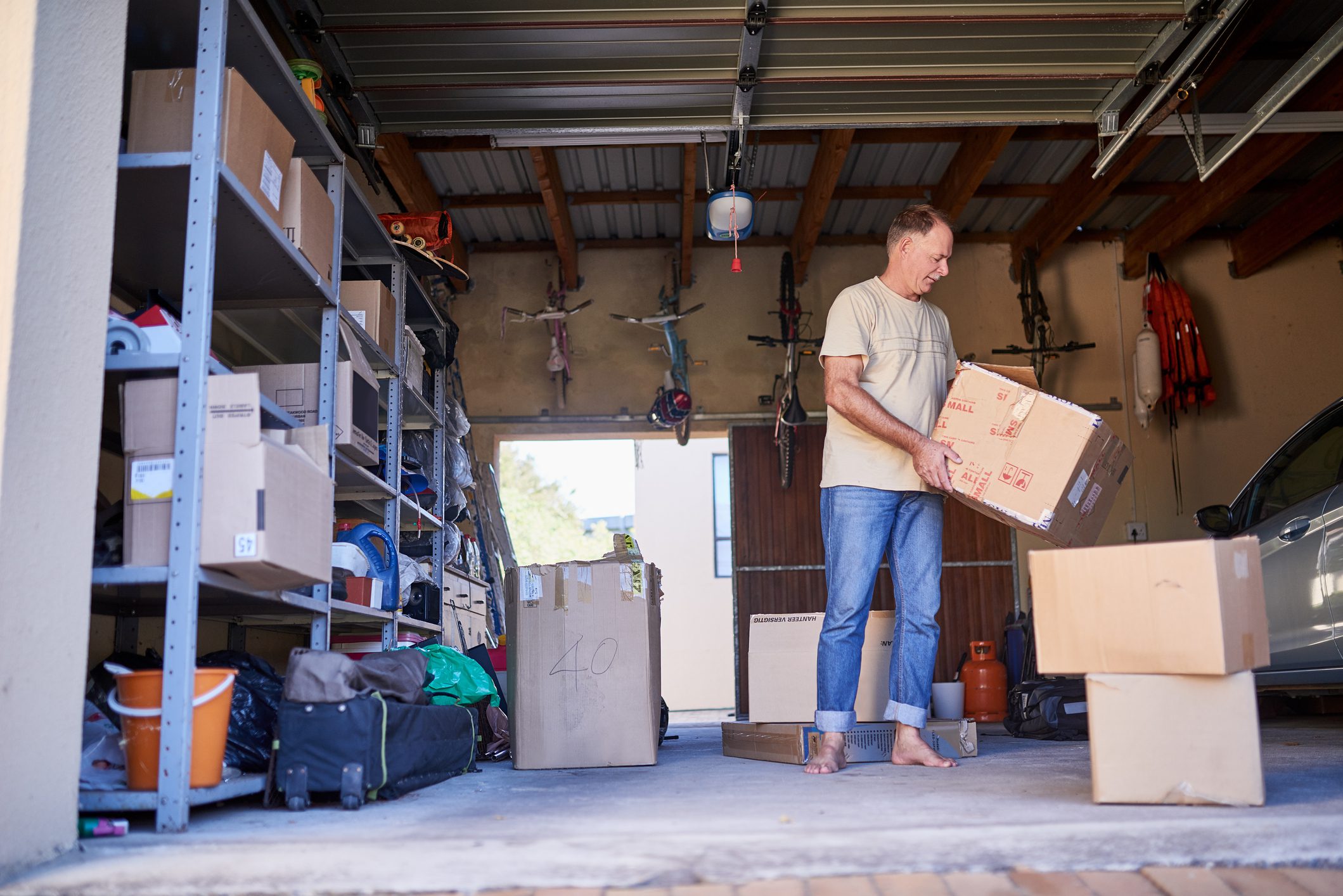 man cleaning out garage